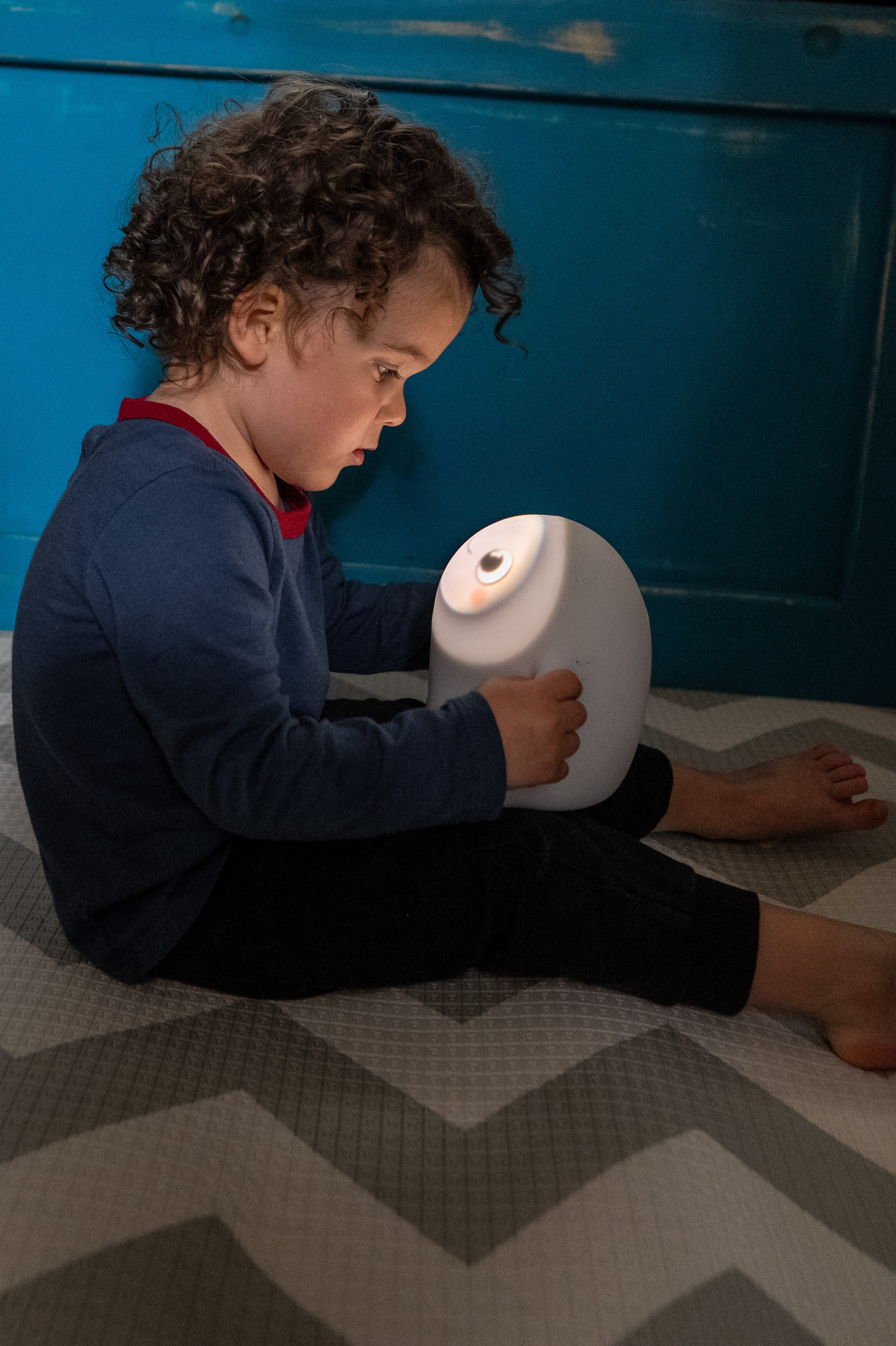 Child playing with Snorble companion